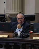 Councillor Hassan at a council committee meeting
