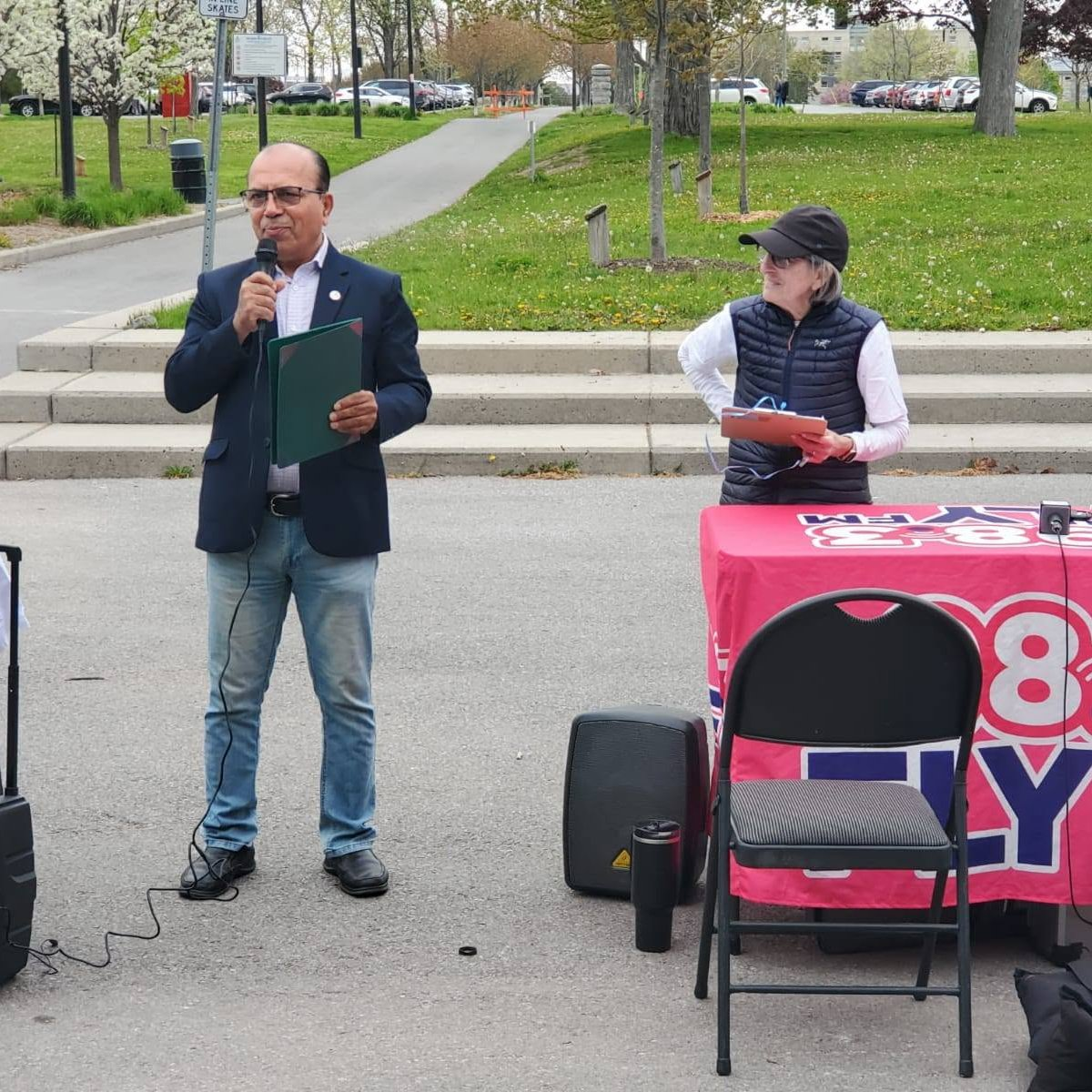 Jimmy Hassan speaking at a community event
