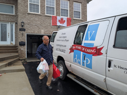 Jimmy Hassan delivering food donations