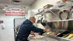 Jimmy Hassan making pizzas for the Santa Slices Project